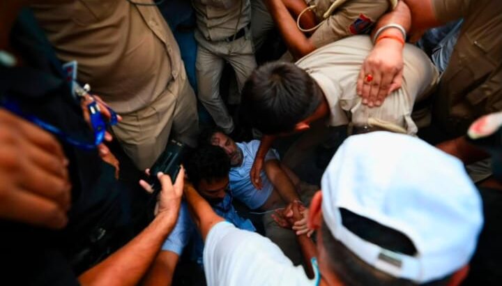 Political reactions and public discussion after Rahul Gandhi's detention in Delhi